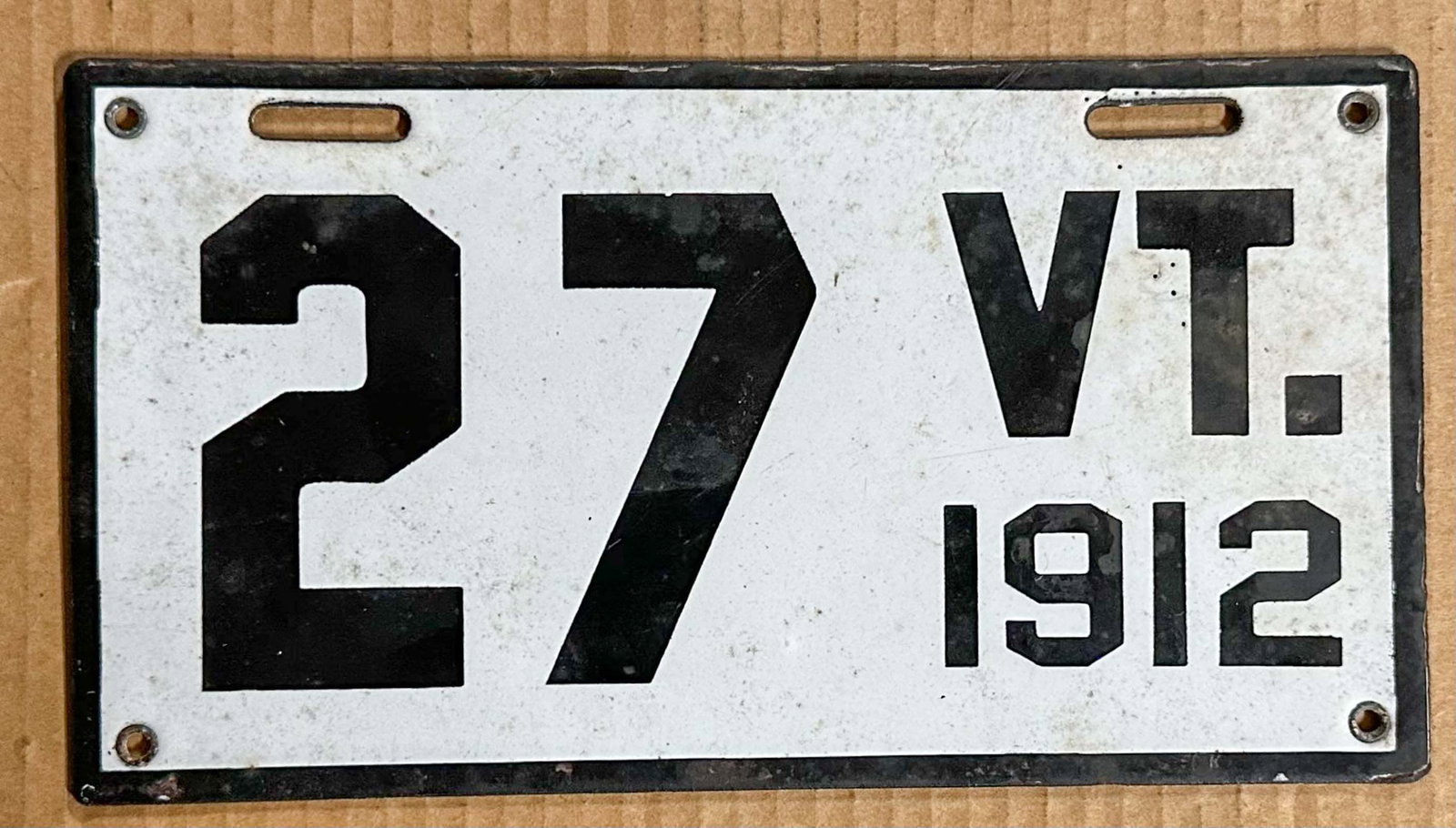 License Plate: 1912 Vermont two digit porcelain license plate, #27.