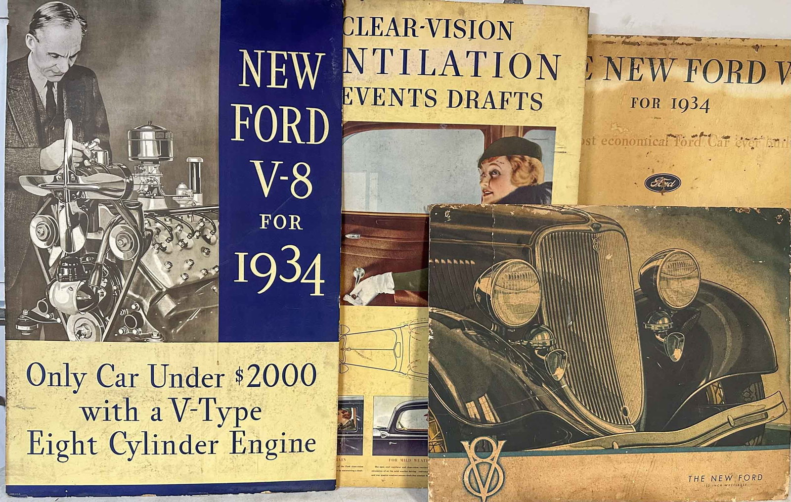 Ford Lot: 1933 - 1934 Ford V 8 dealer showroom card posters, 1933 grill, 28 x 23, three 1934 24 x 37 each, condition as shown in photo.