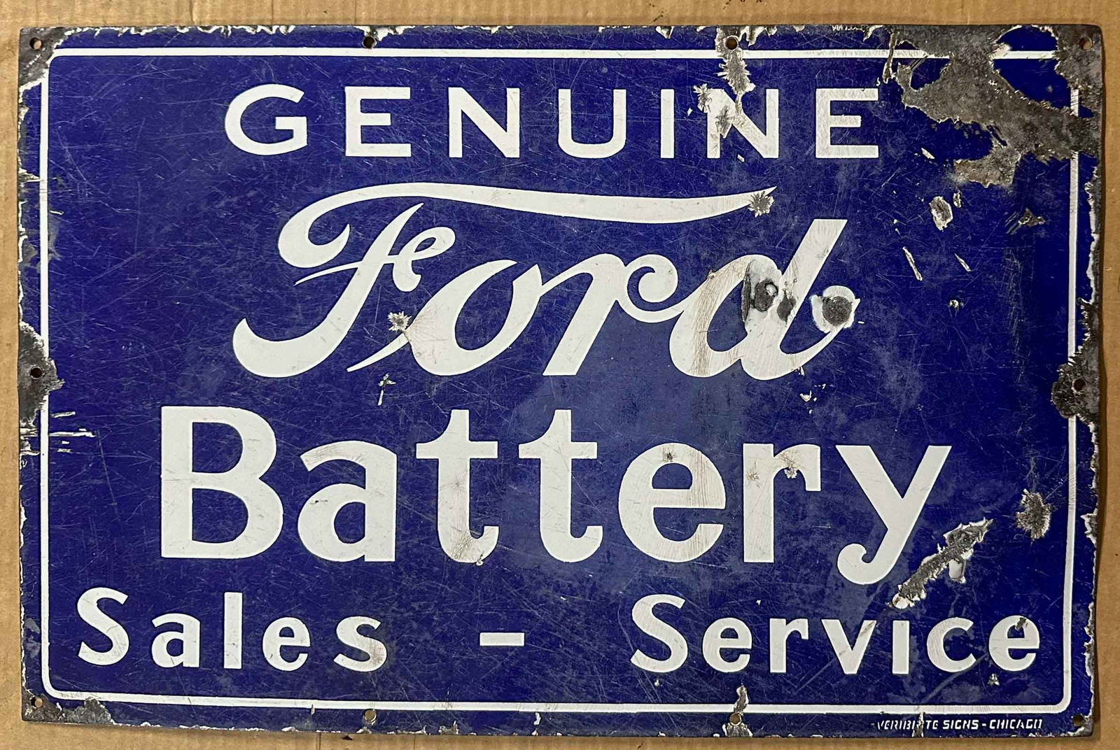 Sign: Genuine Ford Battery Sales - Service porcelain sign, marked Verbrite lower right, single sided, 15 x 23, condition as shown in photo.