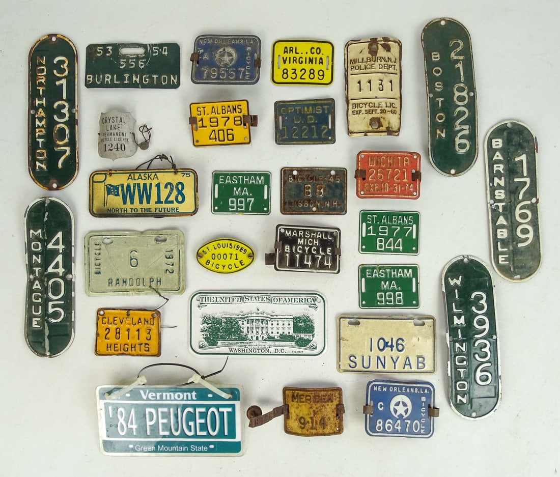 Bicycle License Plates: Collection of bicycle license plates. Glenn Eames Collection Burlington Vermont.