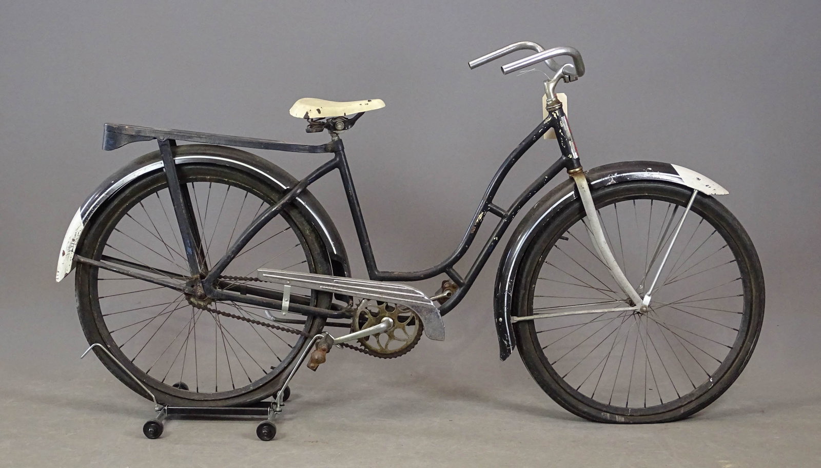 Monark Bicycle: C. 1960's Monark bicycle. 19" frame. Has rear rack. Fair condition.