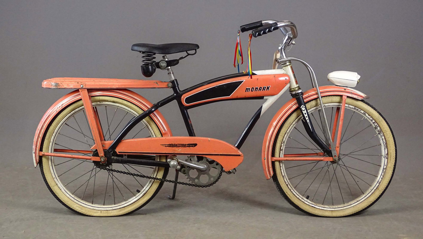 Monark Child's Balloon Bicycle: Monark Child's Balloon tire tank bicycle. Front light and rear rack. Good condition.