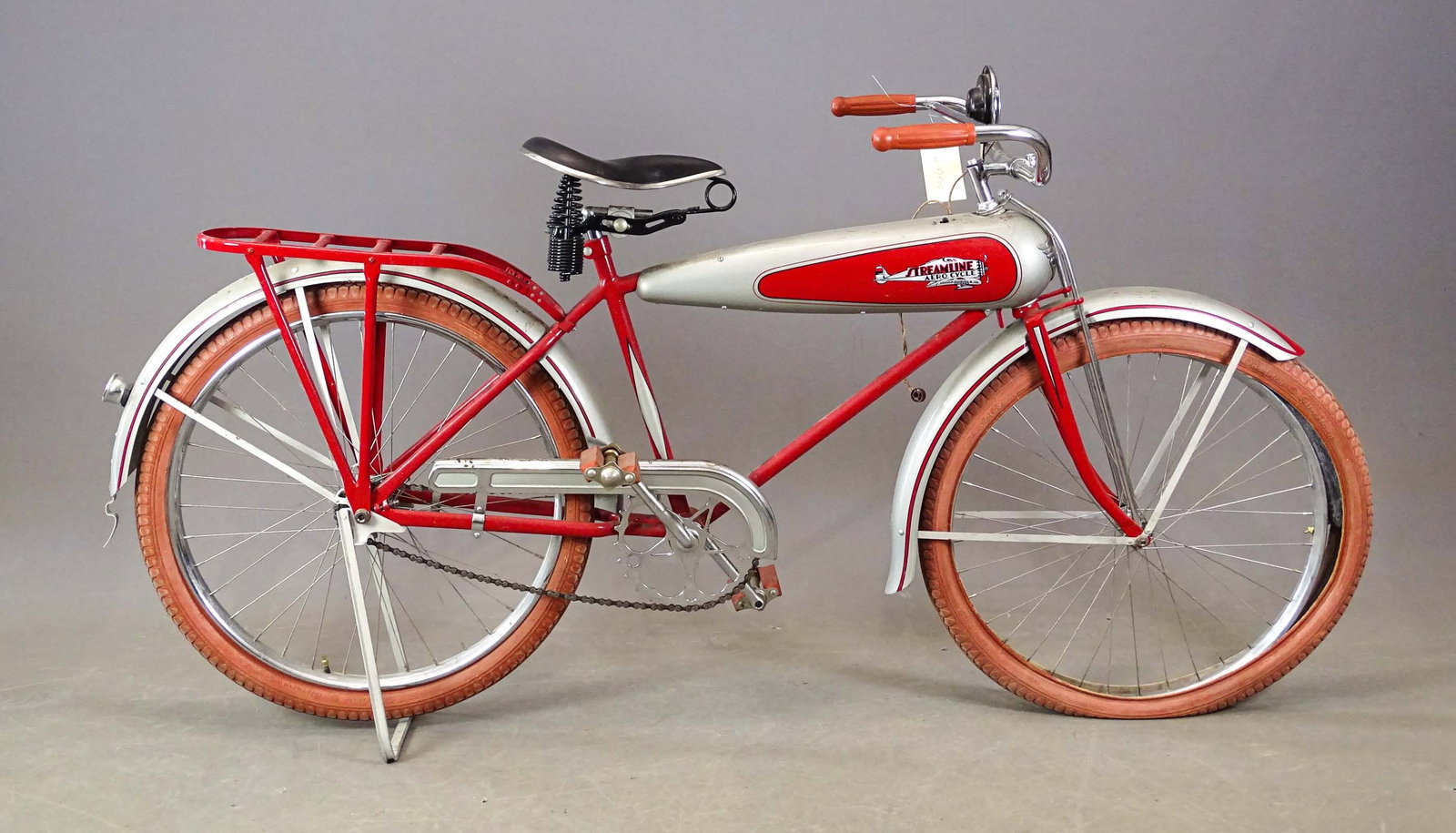 Pre-War Schwinn Streamline Bicycle: Pre-War Schwinn Streamline Aero Cycle tank bicycle. Older restoration. Includes: Troxel Saddle, "EA" horn, rear carrier. Good condition.