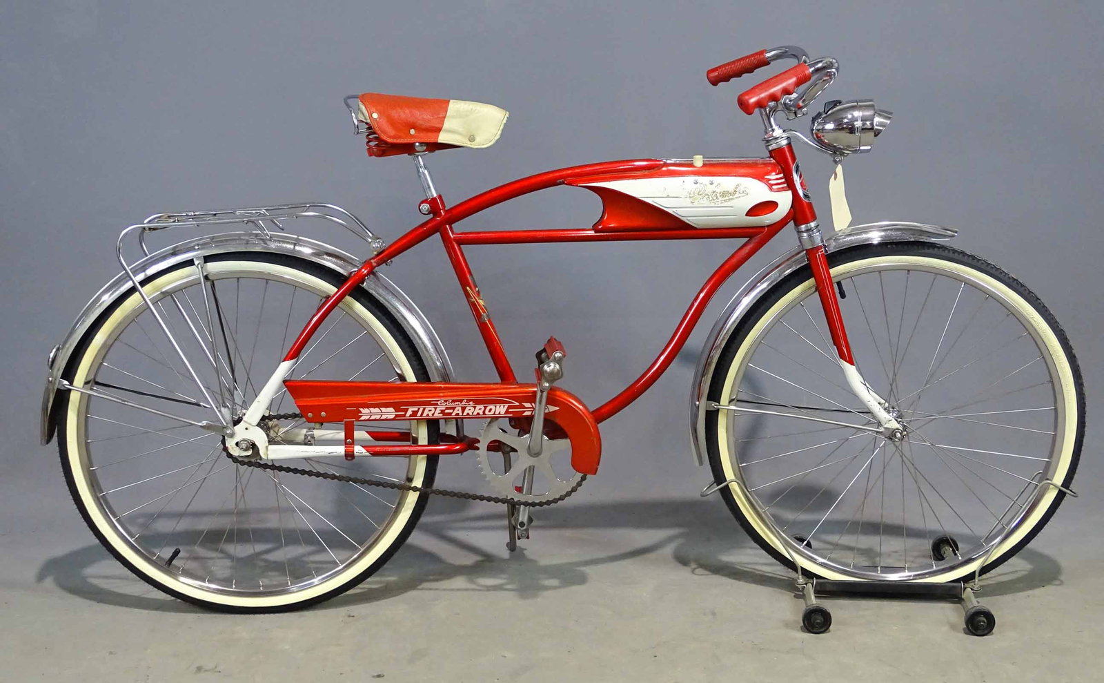 Columbia Fire-Arrow Bicycle: C. 1957 Columbia Fire-Arrow Middle Weight bicycle. 18" frame, front light, rear rack. Good condition.