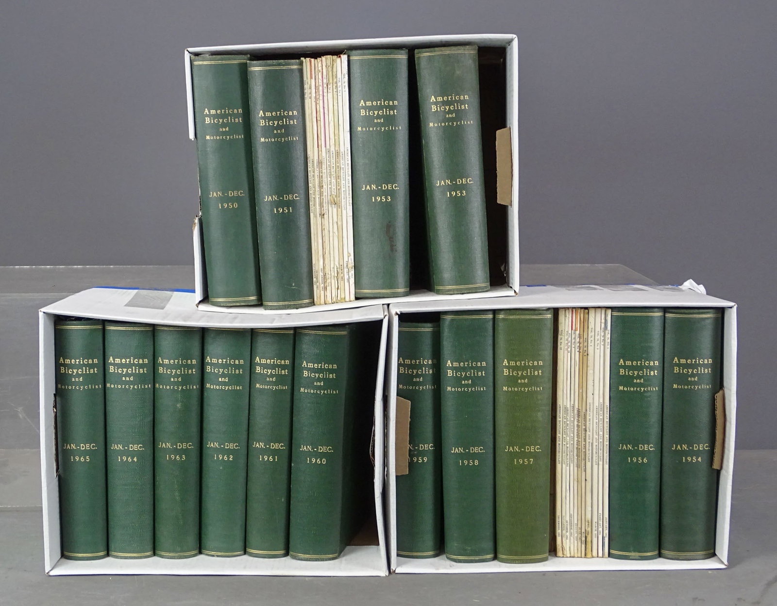 American Bicyclist and Motorcyclist Hardbound Volu: Collection of American Bicyclist and Motorcyclist hardbound volumes. Jan.-Dec. 1950, 1951, 1953, 1956, 1957, 1958, 1959, 1960, 1961, 1962, 1963, 1964, 1965, loose magazines (11) 1952 (missing july),