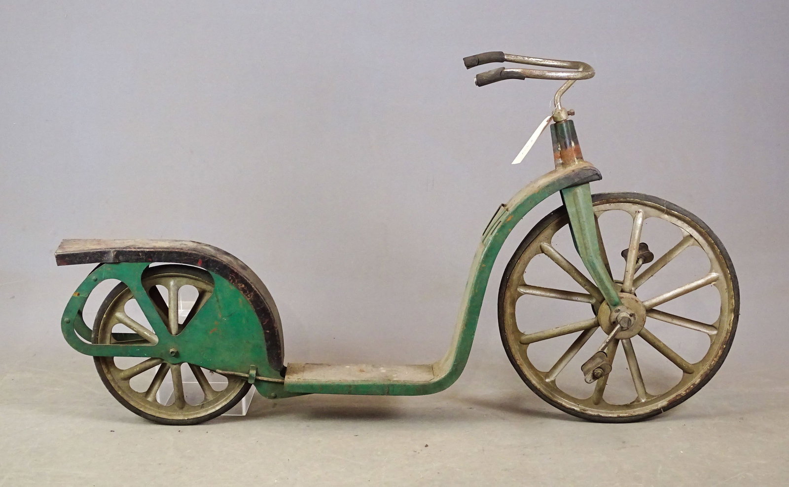 Pressed Steel Scooter: C. 1900's pressed steel scooter. Barn find condition. Mark Mattei Collection.