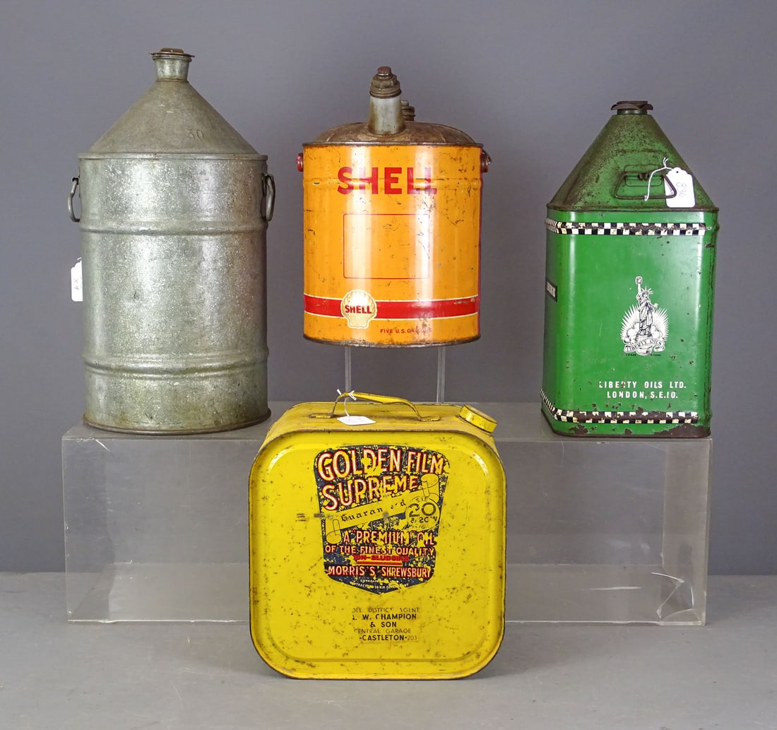 Oil Can Lot: Oil can lot including: "Golden Film Supreme" (16" Ht.), Shell 5 gallon (17" Ht.), container (24" Ht.), "Liberty" (21" Ht.).