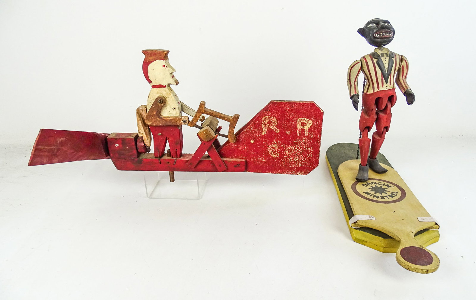 Folk Art Lot: Folk art lot including: "DANCIN' MINSTREL" (19" L., 12 1/2" Ht.), folk art painted Whirligig (17" L., 16" Ht.).