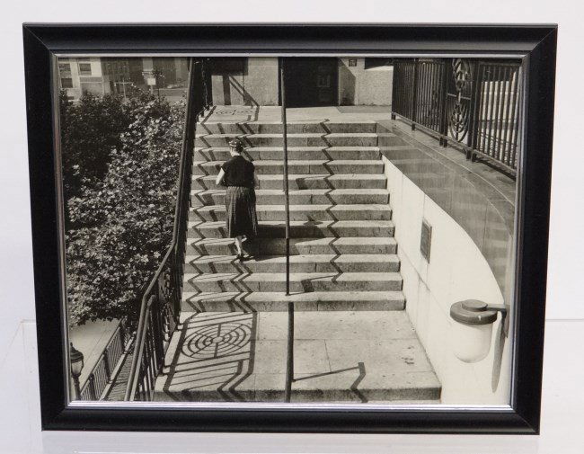Al Macy Photograph: C. 1950's Vintage Al Macy 8 x 10" photograph, woman on steps at U.N.. Estate stamp verso."