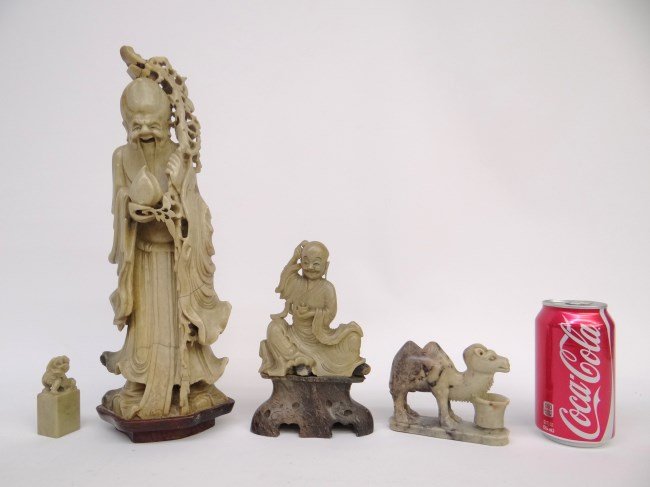 Asian Lot: Asian lot including soapstone figure (15 Ht., damaged), jade seal, soapstone scholar (7" Ht.), soapstone camel (4" length)."