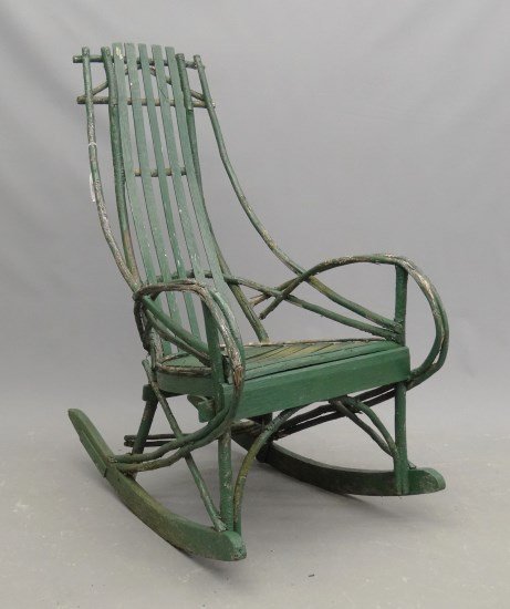 Adirondack Rocking Chair: C. 1900's Adirondack rocking chair in green paint. Imperfections. 41 1/2 overall Ht."