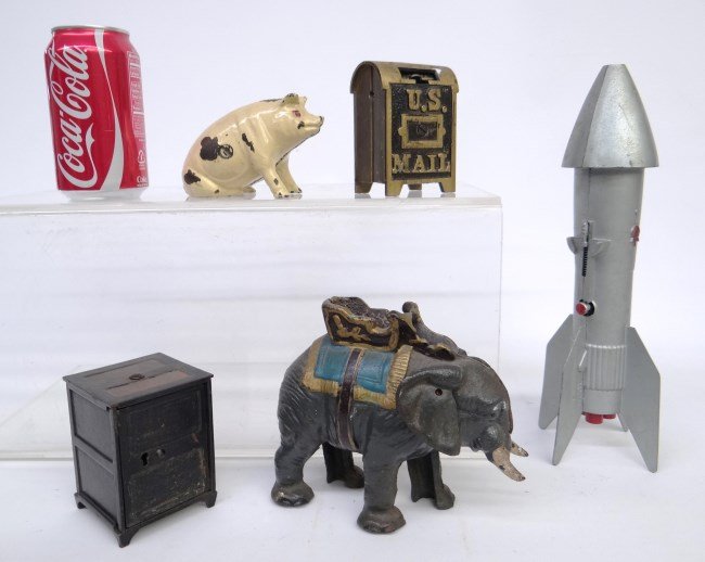 Toy Lot: Lot including U.S. Mail bank, safe bank, rocket bank, elephant bank and pig bank.