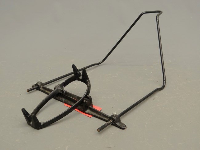 Bicycle Stand: Reproduction iron bear trap type bicycle stand.