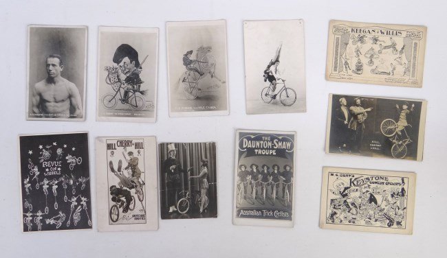 Bicycle Trick Riding Postcards: Lot 11 bicycle trick riding postcards including Keegan & Willis", "Revue On Wheels", etc., fair to good condition."