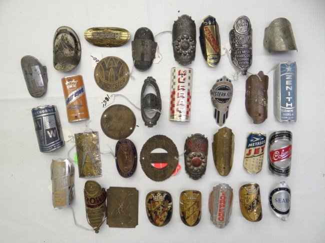 Bicycle Headbadges: Collection of 28 bicycle headbadges including Zenith, Prince, Metasco Jet, Western Flyer, Crown, Hawthorne, Torpedo, Columbia etc., fair to good condition.