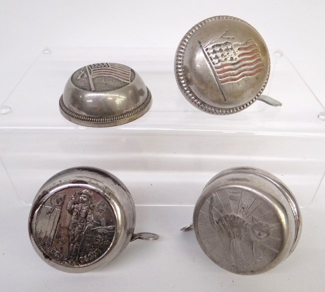 Bicycle Bell Lot: Lot of (3) bicycle bells with cast bell tops including cat, flag and boy scout and one incomplete bell top with flag. Good condition.