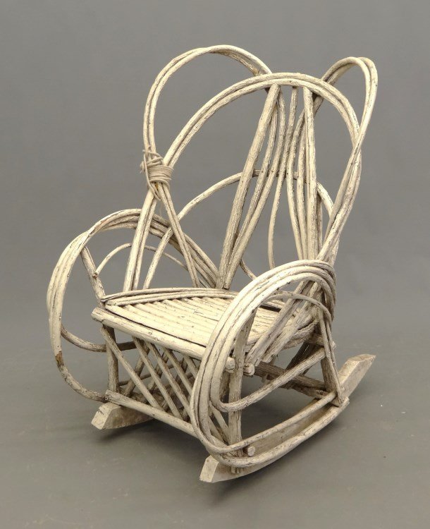Adirondack Chair: Early Adirondack rocking chair in old white paint. 16 seat Ht., 41" overall Ht., attributed to Bill Isaacs, Onondaga Reservation near Syracuse N.Y."