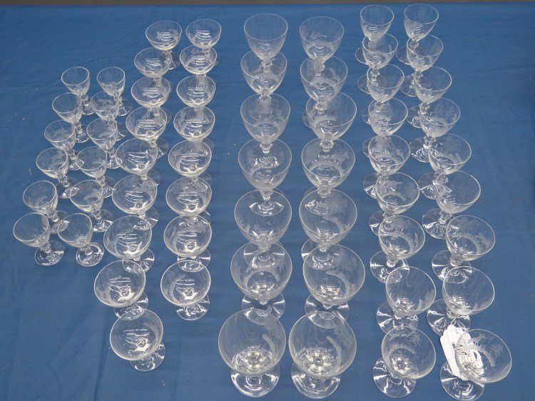 Set of Etched Glasses: Set of 64 etched glasses, etched with Adirondack style scence. Slight imperfections.