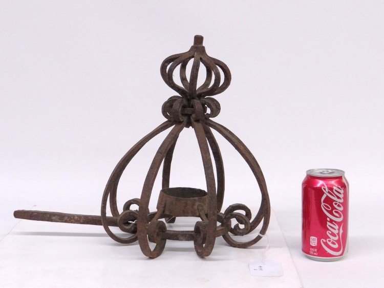Lighting Device: Early iron lighting device. 13 Ht., 16" length."