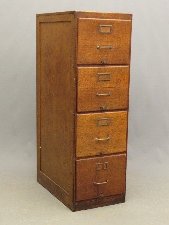 Oak File Cabinet: c. 1900's oak three drawer file cabinet. 16 1/2 x 27" x 52". Marked "Shaw Walker Chicago Muskegon New York"."