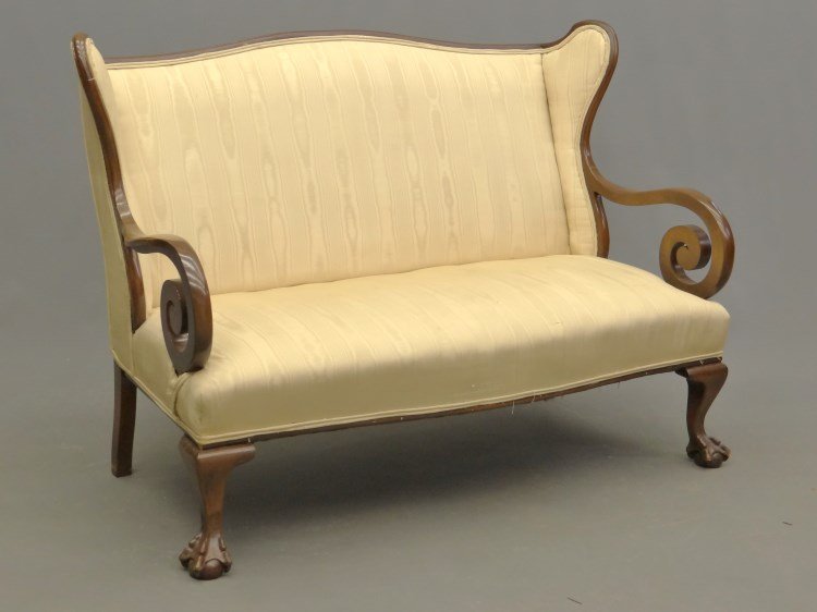 Uphostered Settee: c. 1900's upholstered settee with ball and claw feet. 48 W."