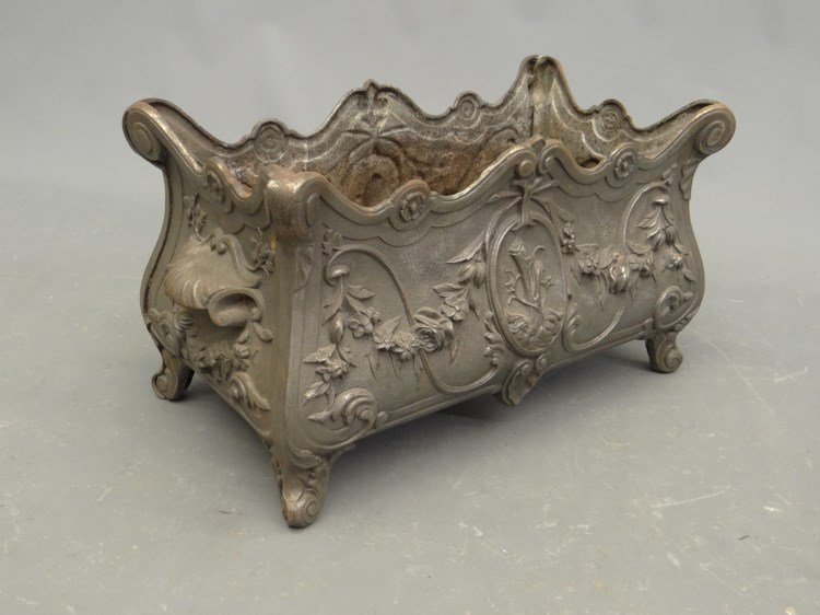 Cast Iron Planter: Cast iron fancy footed planter. 20 x 11" x 12"."