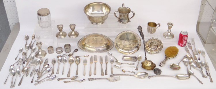 Sterling Silver Lot: Sterling silver lot approx. 80 pieces including souvenier spoons, hollow ware, flatware etc. Note weighted items including candle sticks, brush not included in gram total. 3756 grams.