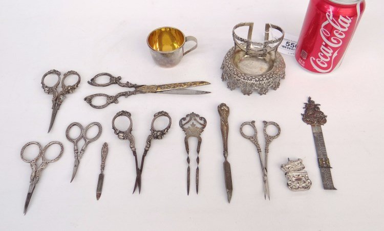 Sterling Silver Lot: Lot of sterling silver including baby cup, hair comb, locket, 6 knitting scissors etc. Total weight 354 g. (note that scissor tips are not sterling).