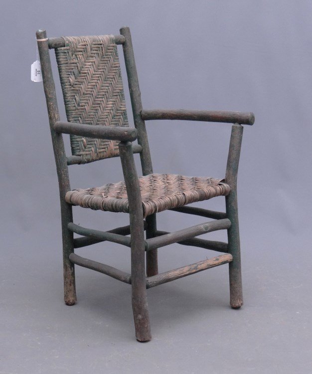 Adirondack Chair: C. 1900's Adirondack chair in green paint. 17 seat Ht., 38" overall Ht."