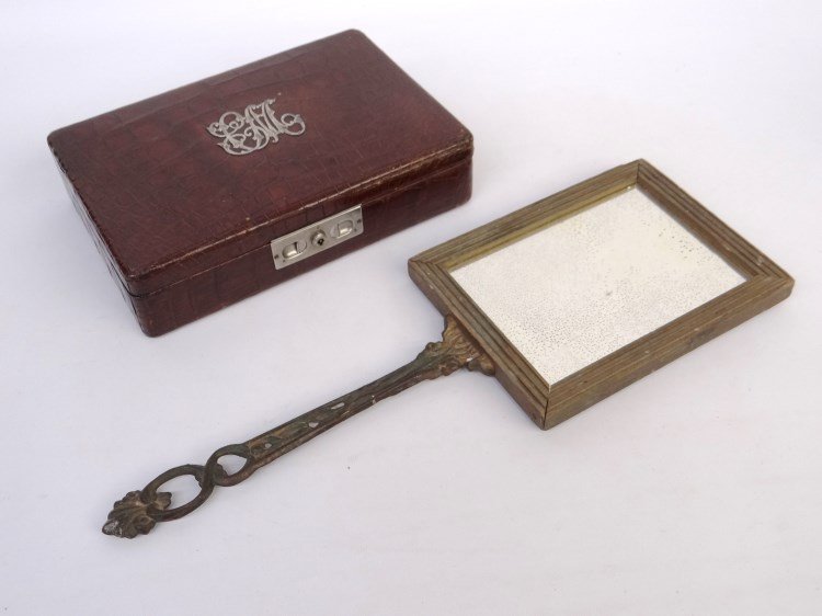 Dresser Box And Mirror: Silver mounted box along with cast iron handle mirror.
