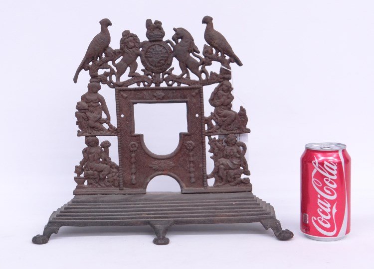 Cast Iron Frame: Cast iron frame decorated with lions, birds and figures. 13 W, 11" Ht."