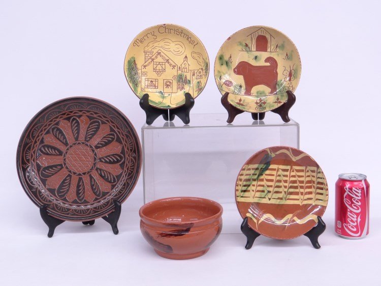 Lester Breininger Redware Lot: Lot five pieces signed Lester Breininger redware including Merry Christmas" plate (chip on rim), dog plate (chip on rim), two plates and bowl."