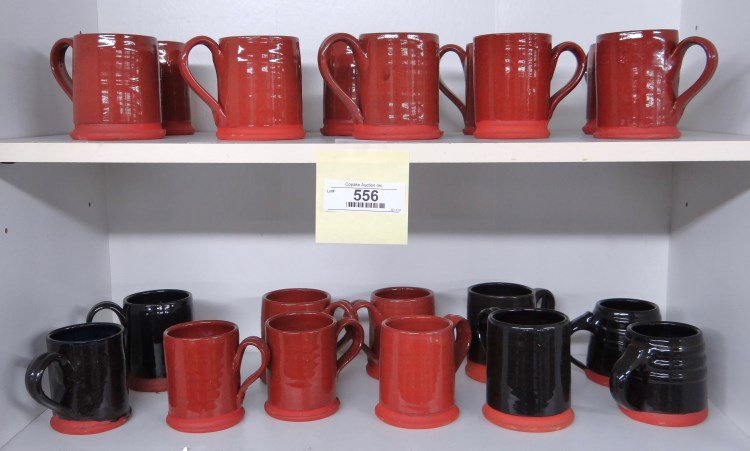 Redware Mugs: Set of 21 redware mugs.