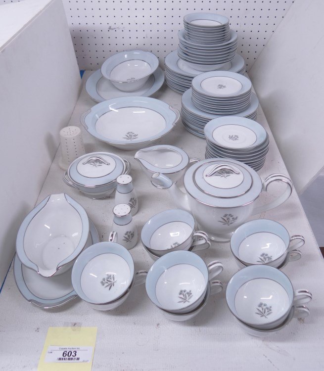 Noritake Dinner Service: Set of Noritake including (8) 10 plates, (8) 8 1/2" plates, (8) 6 1/4" plates, (8) bowls, (8) berry bowls (one chipped), (10) cups and saucers (one plate chipped, teapot, salt and pepper, gravy, two v