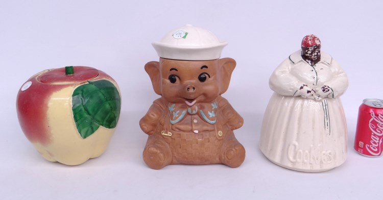 Cookie Jar Lot: Lot three various cookie jars including McCoy mammy, apple and elephant. Imperfections.