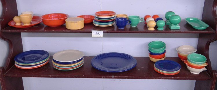 Fiesta Pottery Lot: Fiesta pottery lot over 60 pieces including (6) 10 1/2 plates, (8) 9 1/2" plates, (5) 7 1/2" plates, (5) 5 1/2" bowls, (7) 5" soups, 8 1/2" bowl, 6 1/4" bowl, three cups and more."