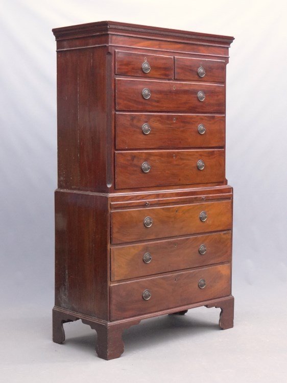 19th c. Chest On Chest: 19th c. George III mahogany chest on chest, reeded corner columns with dentil molded cornice, writing drawer board on base. 40 1/2" x 19 3/4" x 6' Ht.