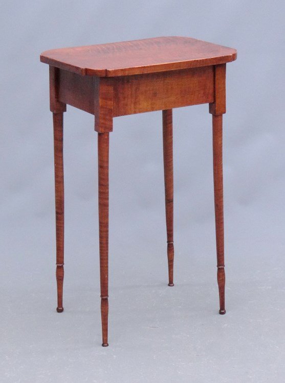 19th c. Sheraton Curly Maple Stand: 19th c. Sheraton button foot curly maple stand with finely turned legs. Top 17 3/4" x 13 1/4", 28 3/4" Ht.