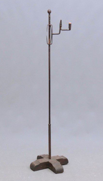 Lighting Device: Wrought iron and wood base floor standard lighting device having candleholder and wick cutter. 48" Ht.