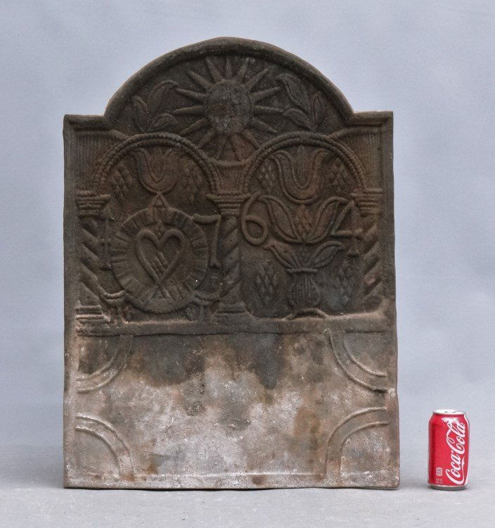 18th c. Fireback: 18th c. fireback with sunburst and tulip decoration dated 1764. 28 1/2" x 20 1/2".