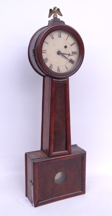 19th c. Banjo Clock: 19th c. mahogany case banjo clock with eagle finial. 32" Ht.