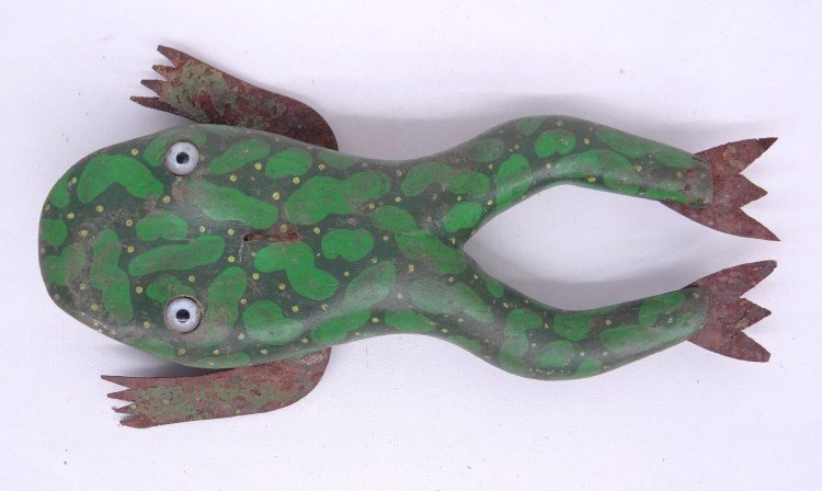 Frog Decoy: Polychrome wooden painted frog decoy with tin hands and feet and glass eyes. 11" length.