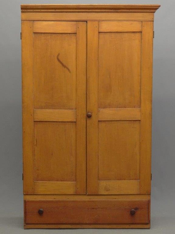 19th c. Shaker Cupboard: Shaker two door wall cupboard with underdrawer. Mt. Lebanon, NY. Case 46 1/2 W. x 14 1/2" D. x 6'9" Ht., has alterations."