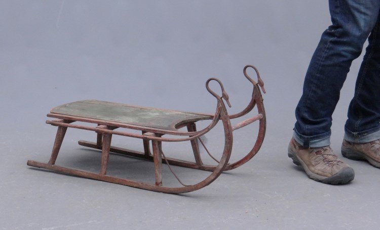 Child's Sled: 19th c. child's sled with metal gooseneck runners. 34 length."