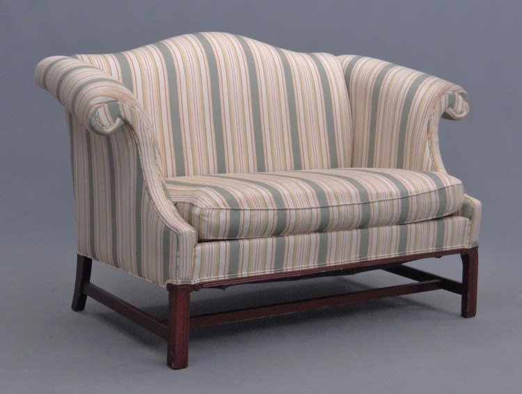 Upholstered Settee: Chippendale style upholstered settee. 51 W."