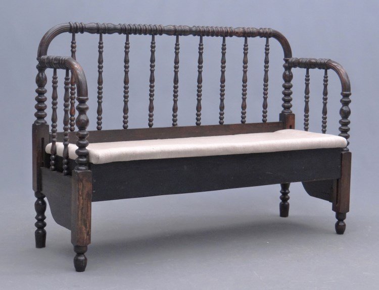 Spool Setttee: Spool settee with cushions. 52 x 17" x 36 1/2"."