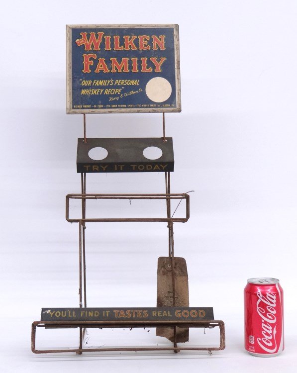 The Wilken Family" Whiskey Display Stand": C. 1900's The Wilken Family" whiskey display stand. 23 1/2" Ht."