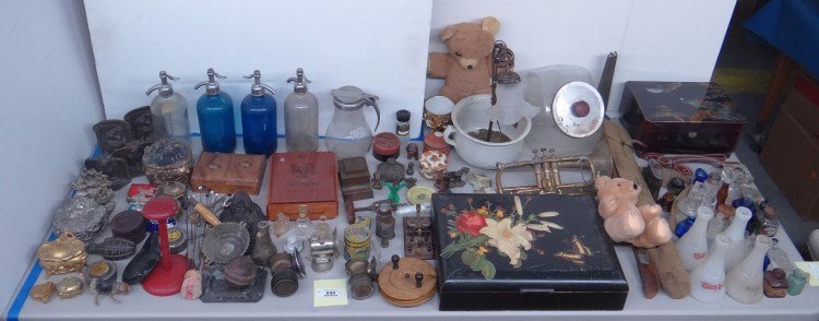 Misc. Lot: Misc. lot including trumpet, jewelry boxes, seltzer bottles, lamp, glassware, U.S. Army flag kit, inkwells, miners lamps, Asian jewelry box etc.
