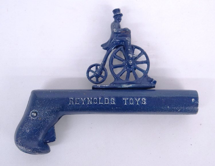Reynolds Toys Ordinary Header Toy: Cast metal Reynolds Toy Ordinary header toy gun. 6 length. Good condition. David Metz Museum."