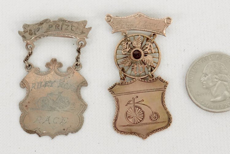 Bicycle Medal Lot: Lot two bicycle medals one dated 1880 with Star bicycle and Riley Road race (with safety bicycle). Pedaling History Museum.